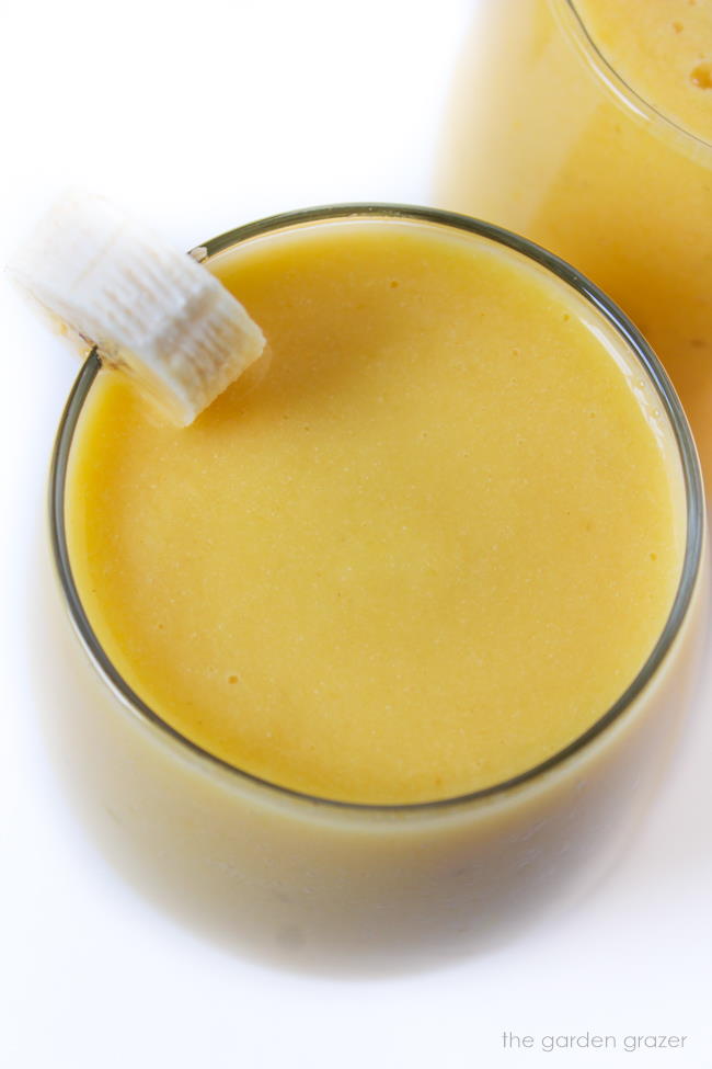vegan creamy tropical smoothie in a glass
