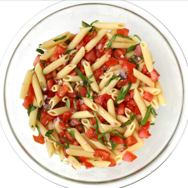 Vegan fresh summer pasta in a glass bowl