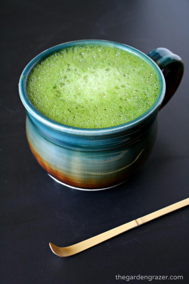 Vegan soy matcha latte with vanilla in a large mug