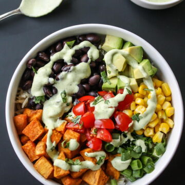 Black bean sweet potato bowl with cashew lime cream on top