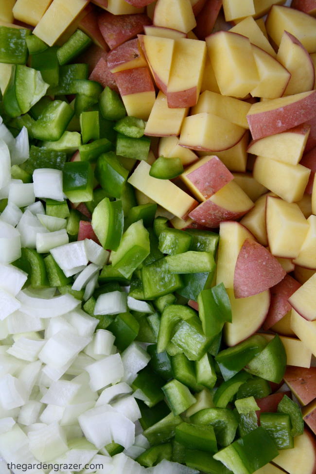 Raw ingredients diced on a cutting board