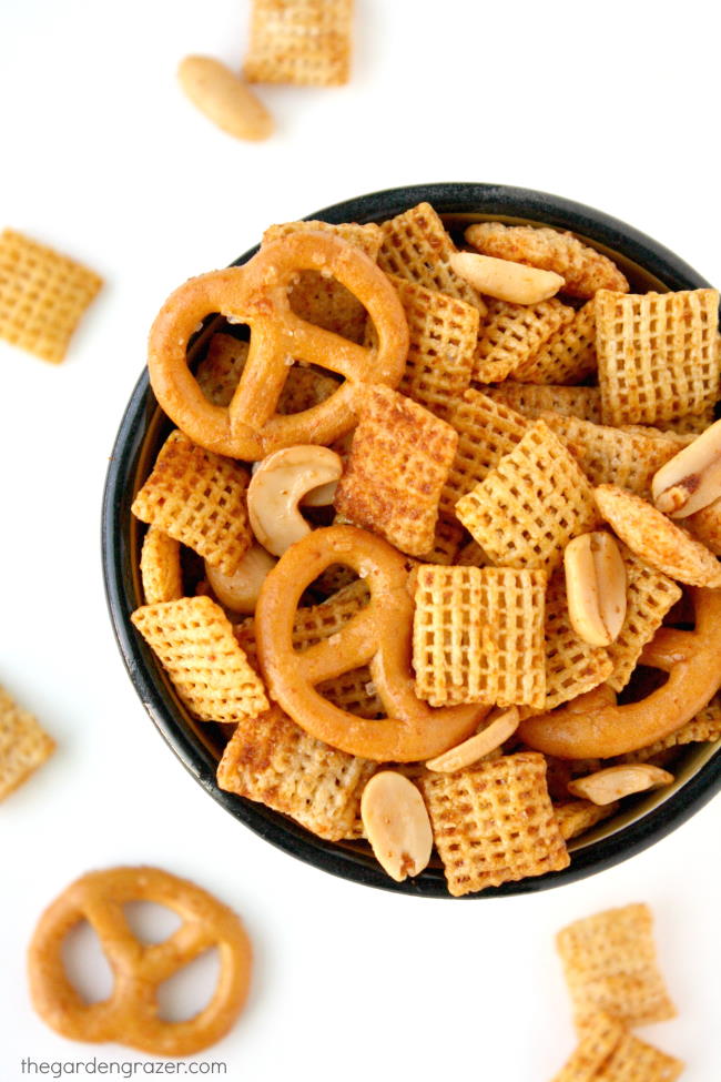Vegan chex mix with pretzels in a small bowl