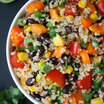 Bowl of Mexican Quinoa Salad with cilantro and lime