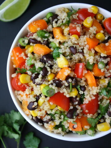 Bowl of Mexican Quinoa Salad with cilantro and lime