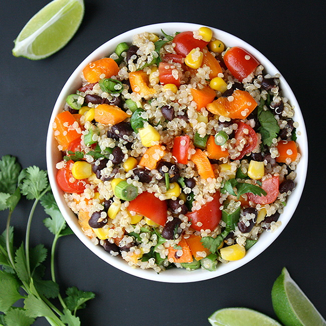 Mexican-style quinoa salad with black beans in a white bowl