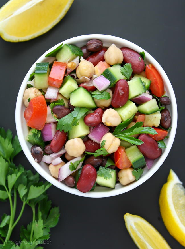 Mediterranean bean salad with herbs and lemon in a small bowl