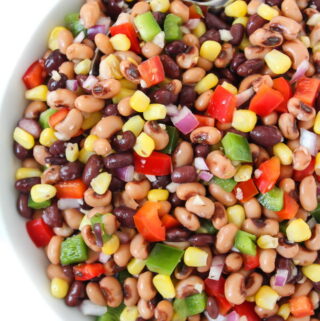 Healthy vegan cowboy caviar in a bowl with spoon