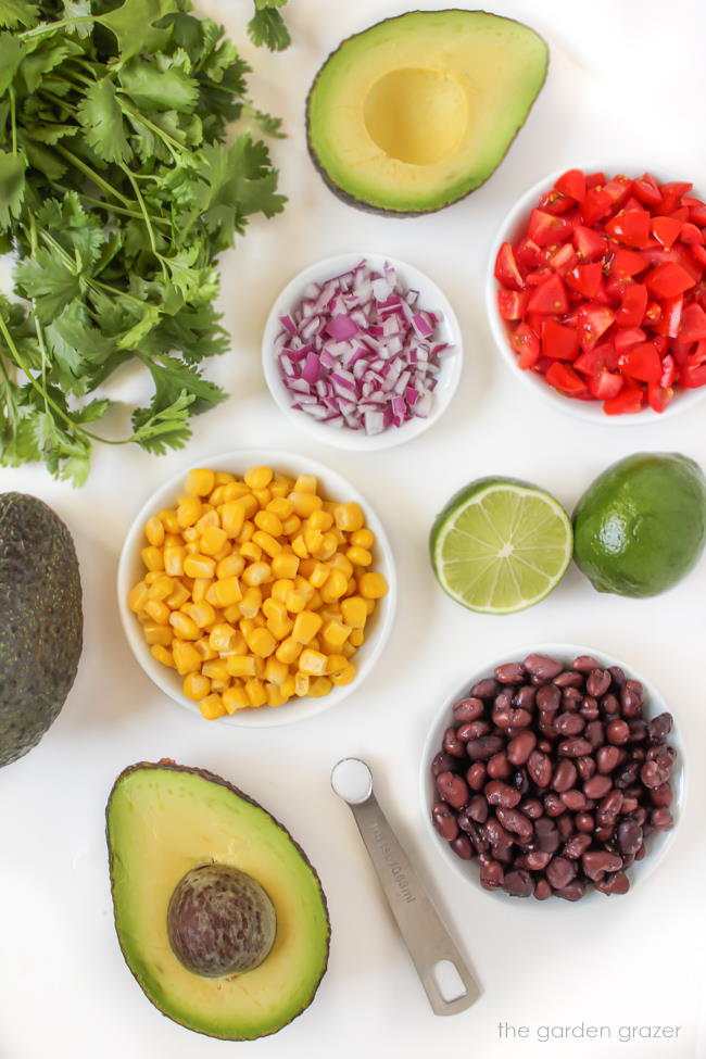 Fresh ingredients laid out on a white table