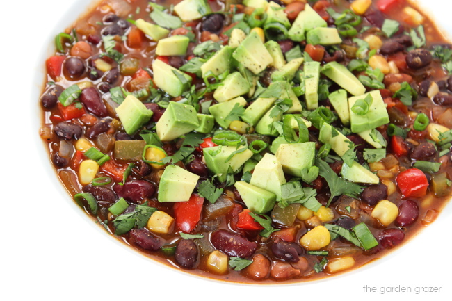 White bowl with vegan bean and corn chili