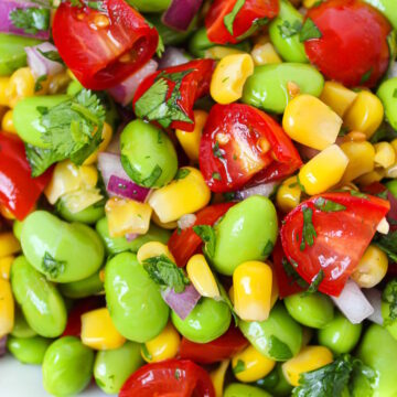 Close up view of edamame corn salad with lemon dressing