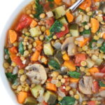Lentil Vegetable Soup in a bowl with spoon