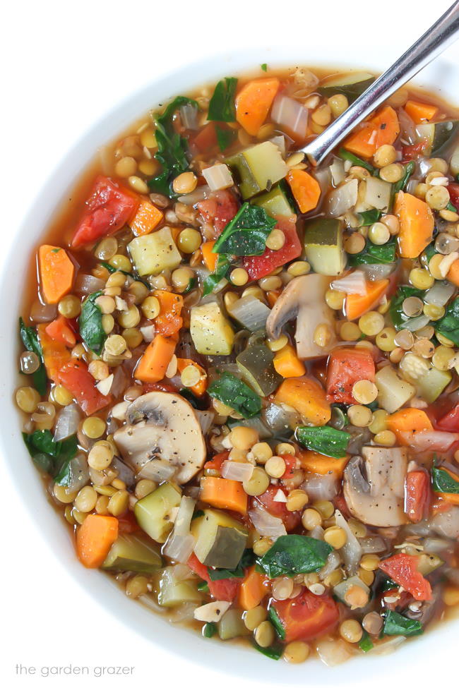 Lentil Vegetable Soup in a bowl with spoon