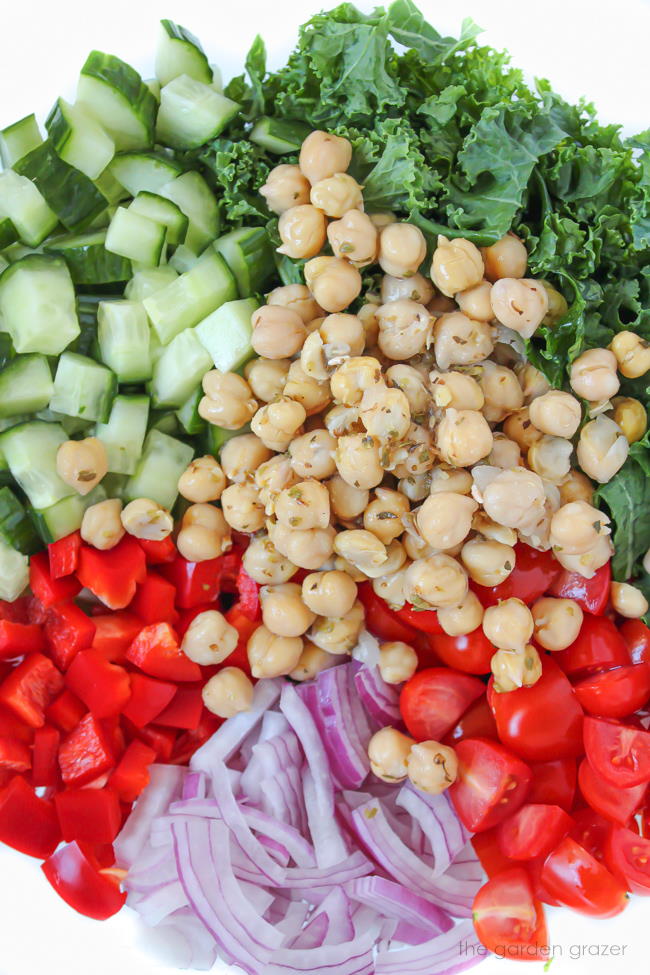 Bowl of Kale Greek Salad with marinated chickpeas