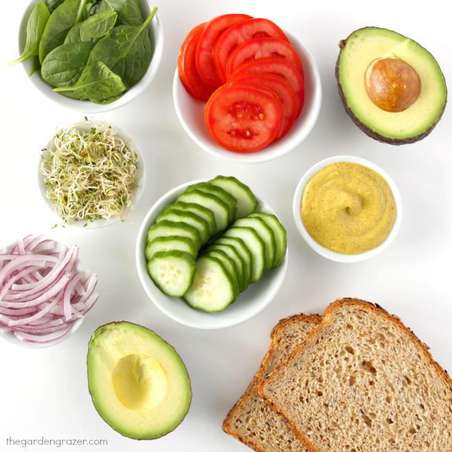 Fresh ingredients laid out on a white table