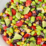 Vegan black bean avocado salad in a white bowl