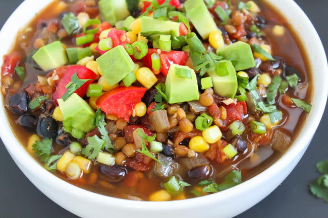 Close-up view of black bean lentil soup in a small bowl