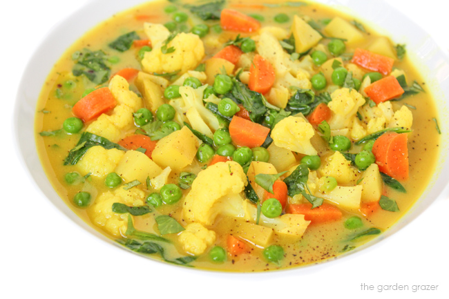 Coconut curry soup in a bowl with vegetables
