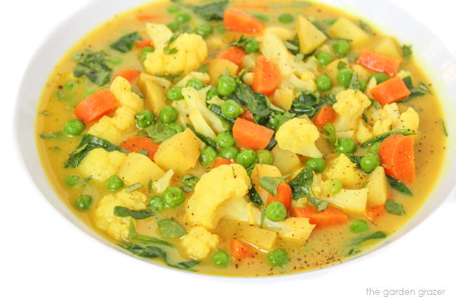 Coconut curry soup in a bowl with vegetables