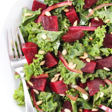 Balsamic Beet Kale salad on a plate with fork