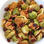 Roasted maple brussels sprouts on a white plate