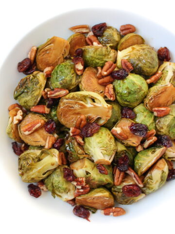Roasted maple brussels sprouts on a white plate