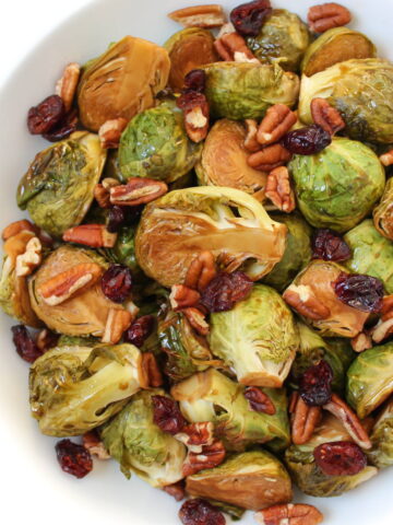 Roasted maple Brussels sprouts on a white plate