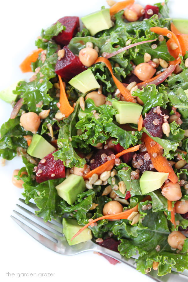 Vegan superfood power salad with beets and chickpeas on a white plate