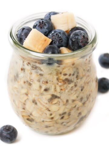 vegan almond vanilla overnight oats in a small glass jar