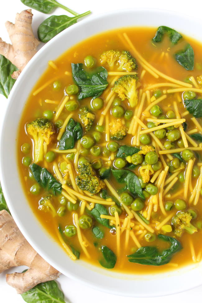 Vegan turmeric noodle soup in a bowl