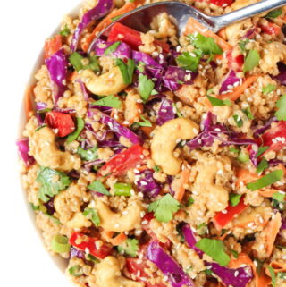 Vegan Thai Style Quinoa Salad in a bowl with spoon