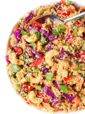 Vegan Thai Style Quinoa Salad in a bowl with spoon