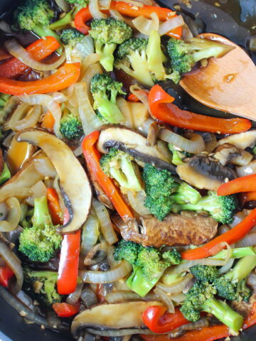 Broccoli mushroom stir fry in a skillet