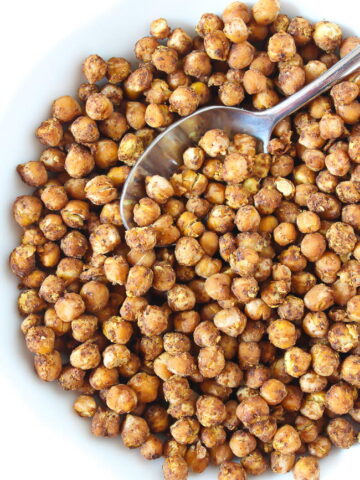 Bowl of nacho roasted chickpeas after baking