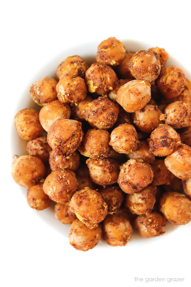 Close up of nacho roasted chickpeas in a small bowl