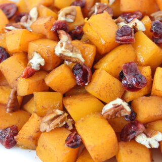 Roasted butternut squash with maple and cinnamon on a plate