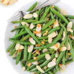 Almond green beans on a plate with fork