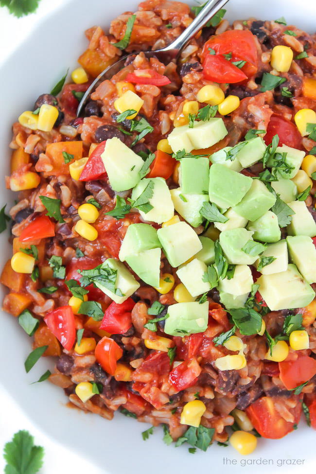 Beans and rice in a bowl with spoon