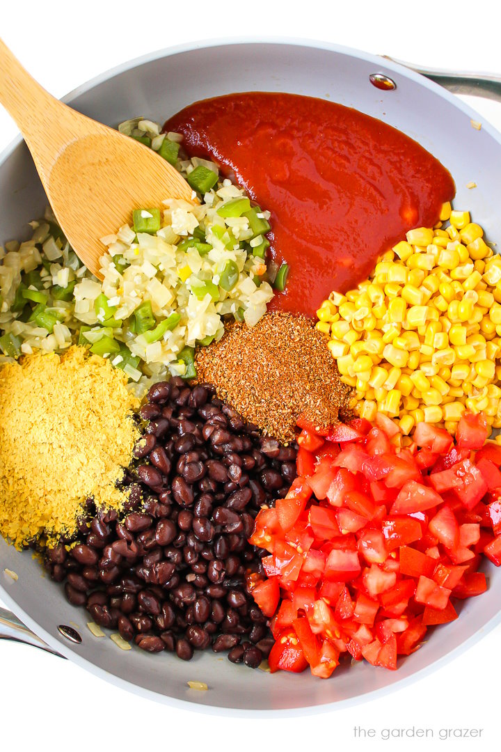 Preparing ingredients in a large skillet before stirring together