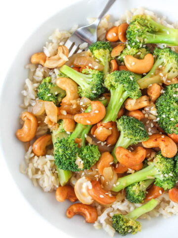 Bowl of vegan cashew stir fry with broccoli
