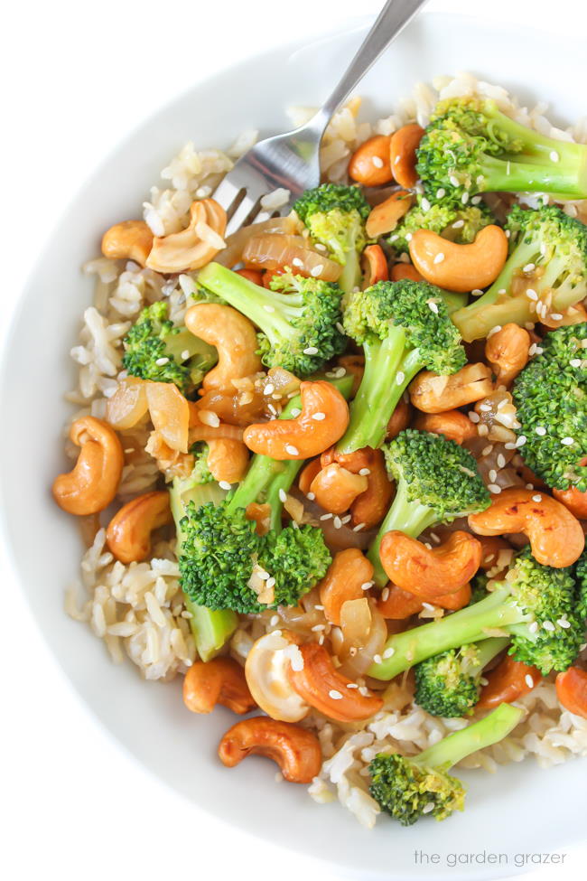 Bowl of vegan cashew stir fry with broccoli