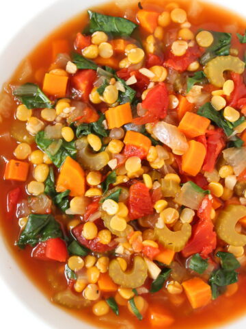 Vegan split pea vegetable soup in a white bowl