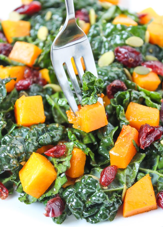 Butternut Squash Kale Salad with fork piercing the salad