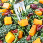 Butternut Squash Kale Salad with fork piercing the salad