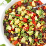 Bowl of vegan southwest black bean soup with avocado