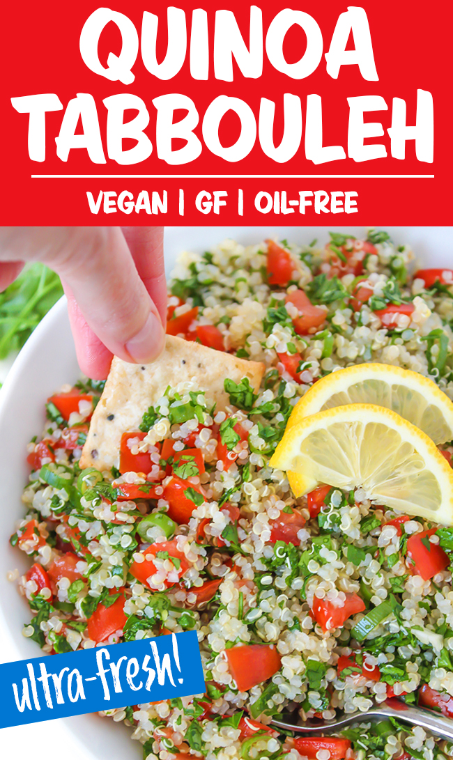 Quinoa tabbouleh in a bowl with lemon slices and cracker