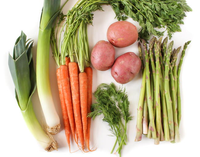 Fresh asparagus, carrots, dill, potatoes, and leeks