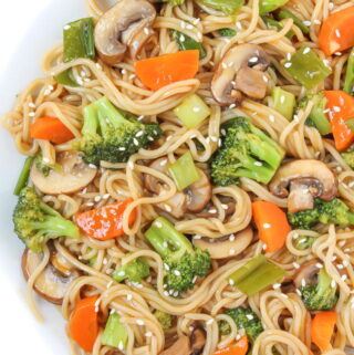 Plate of vegan teriyaki noodles with vegetables