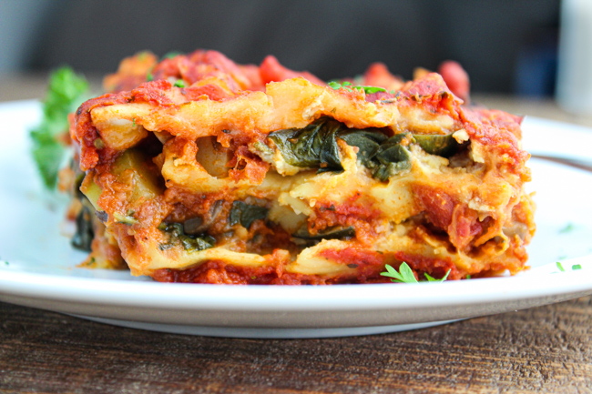 Serving of lasagna on a small white plate