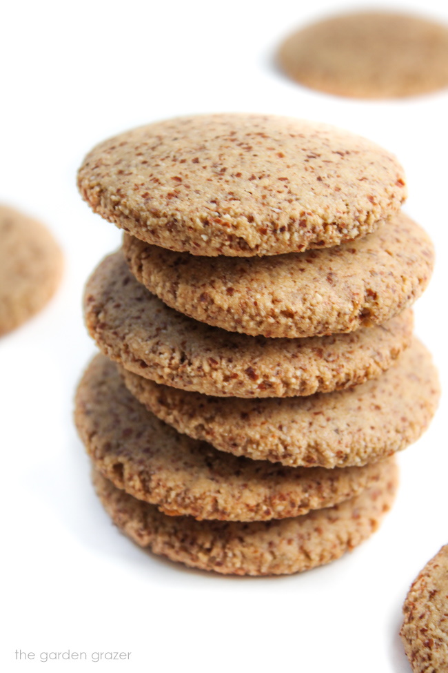 Vegan almond flour maple cookies stacked on top of each other