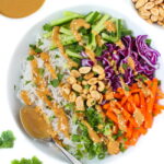 Vegan spring roll in a bowl with rice noodles and peanut sauce
